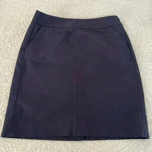 Banana Republic size 6  black skirt with side pockets and slit in back.